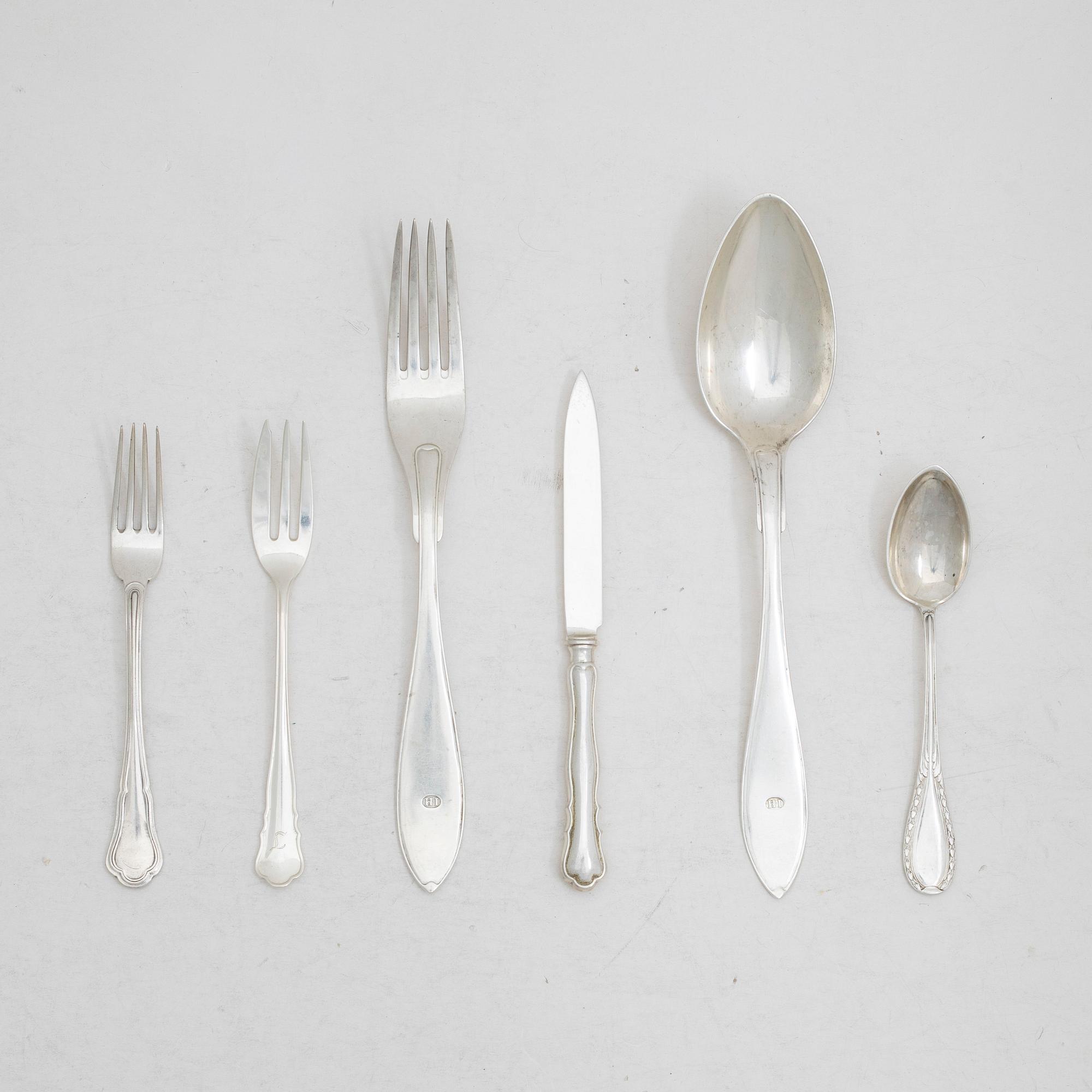 29 pieces of silver cutlery, including Chippendale and Svensk Spets, GAB among others, 20th century.