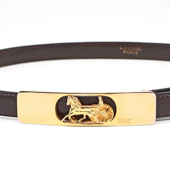 CÉLINE, a brown leather belt.