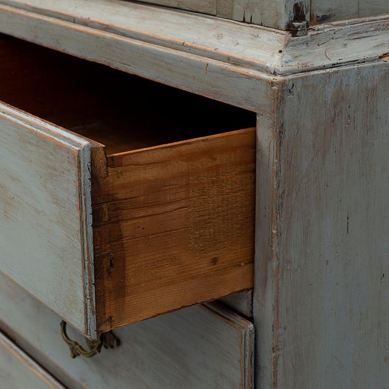 A late 18th century rococo painted cabinet.