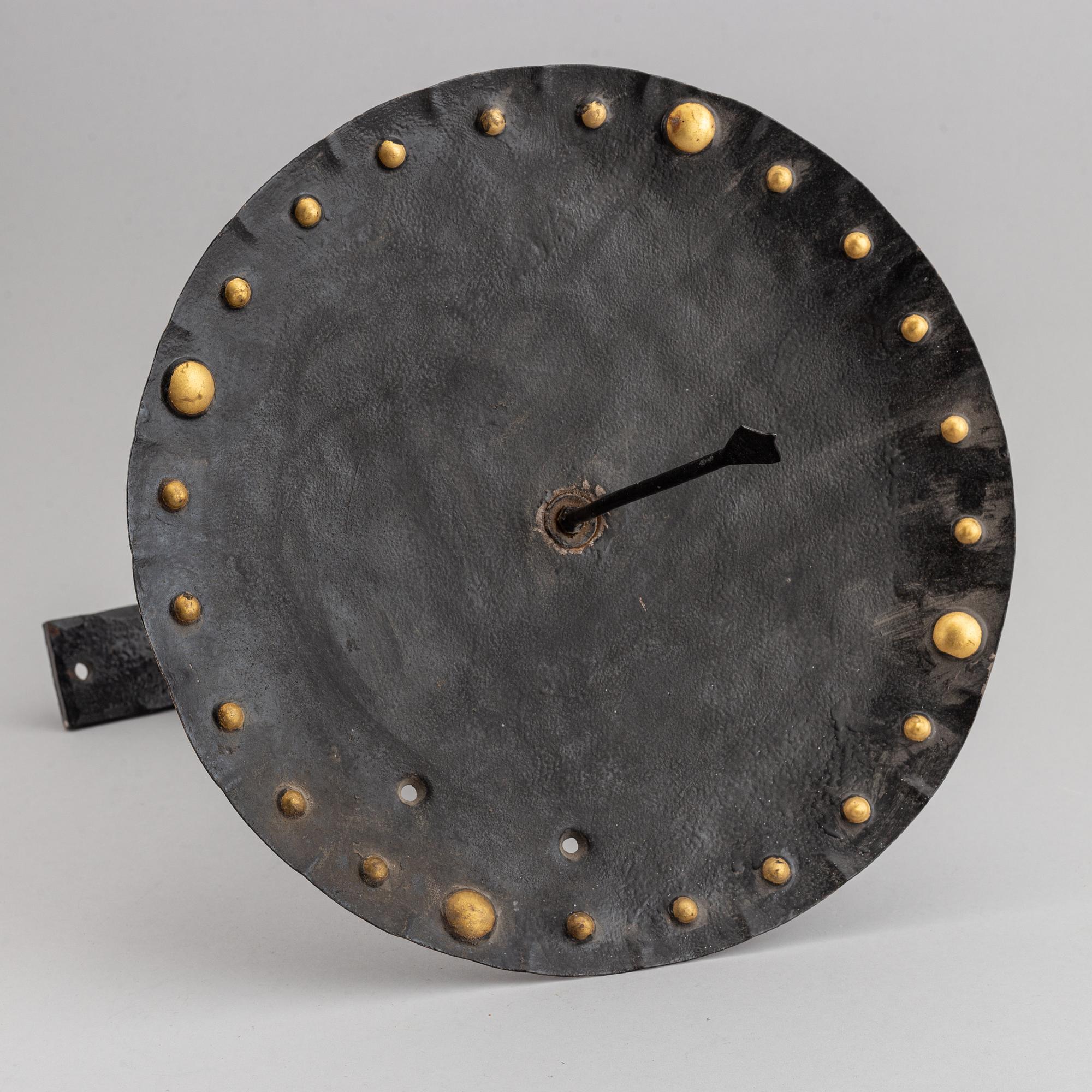 A 20th century painted metal sun dia, signed SLl.