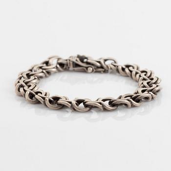 Silver bracelet.