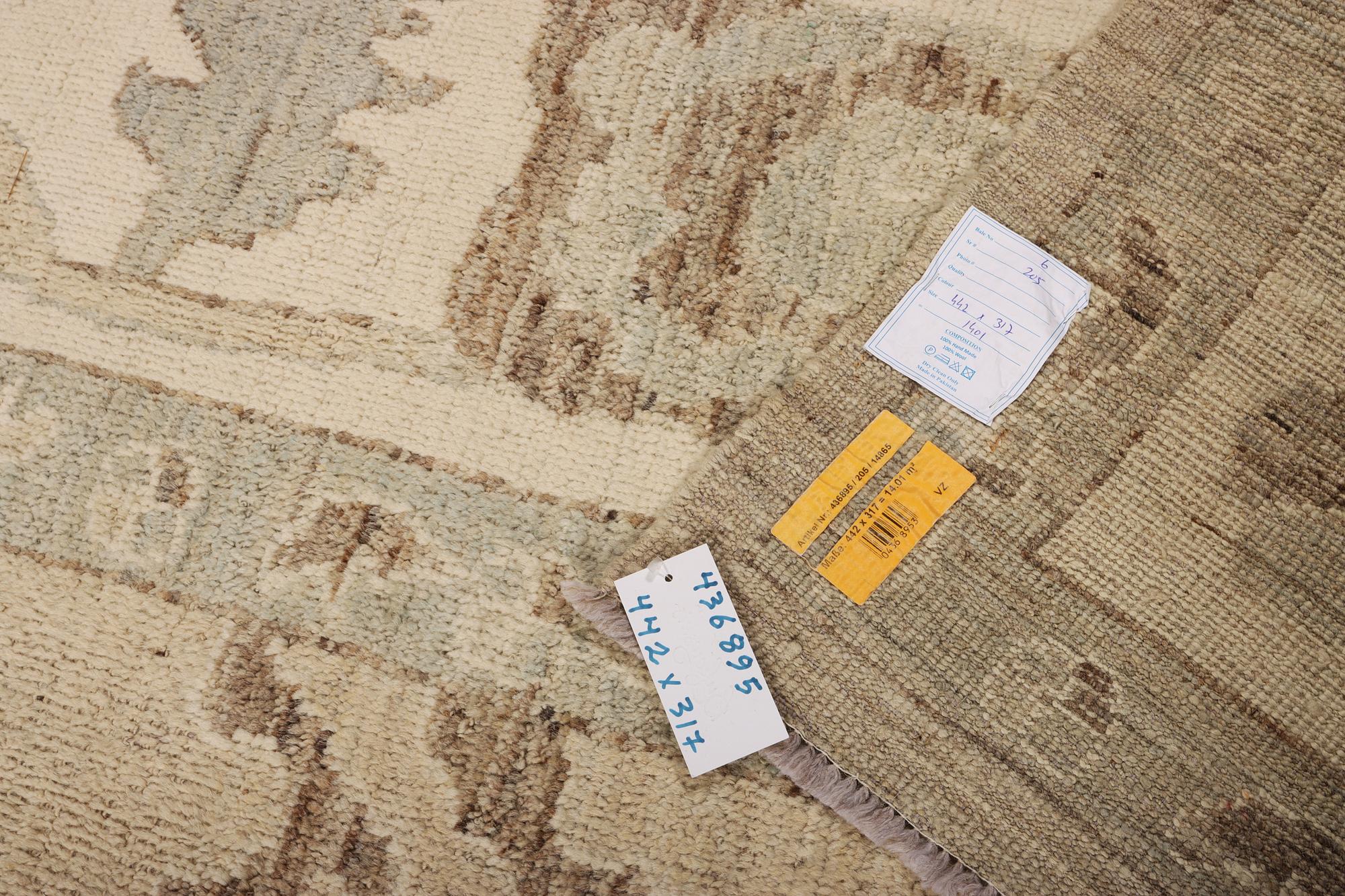 An Ushak design carpet, c. 442 x 317 cm.