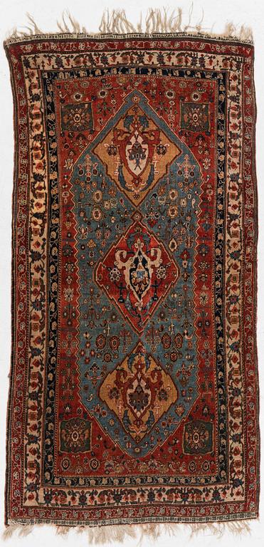 An antique Qashqai rug, southeastern Iran, c 204 x 102 cm.