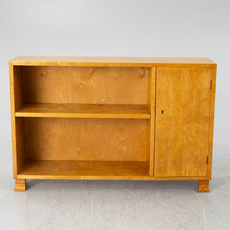 A bookcase with cabinet, 1930's.