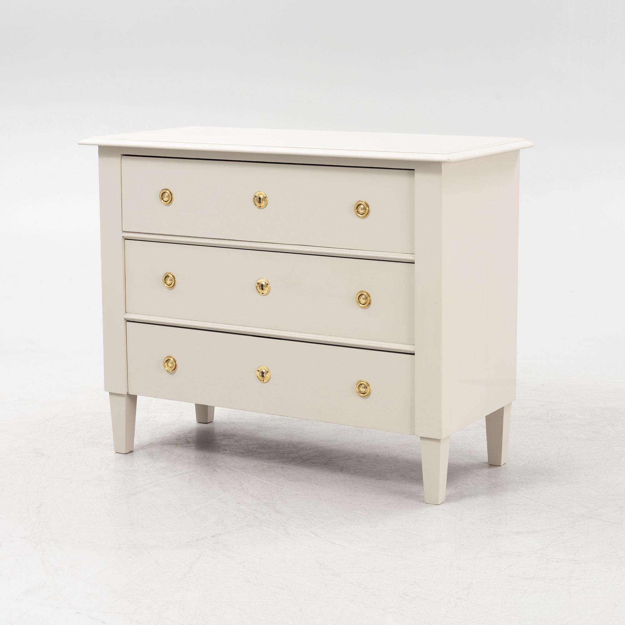 A Gustavian style chest of drawers, around 1900.