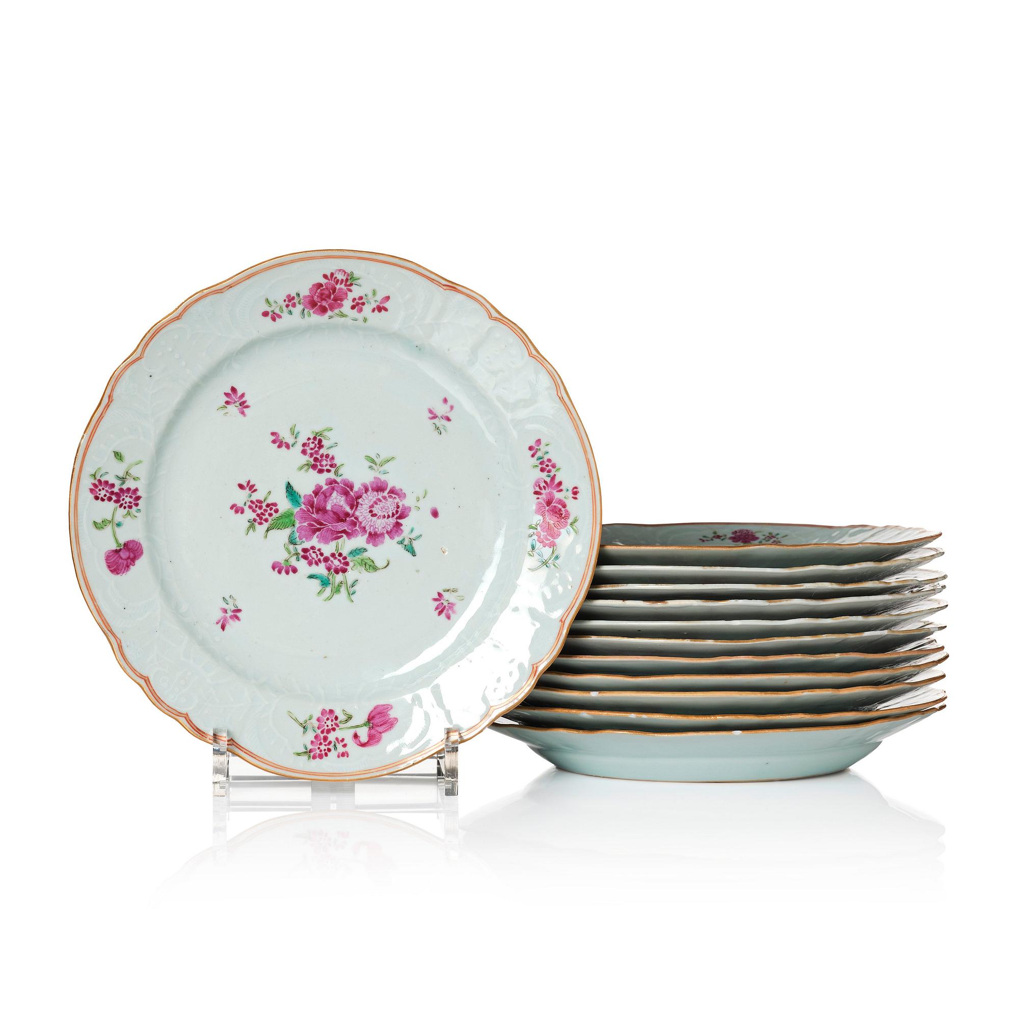A set of 12 famille rose dinner plates, Qing dynasty, Qianlong (1736-95).