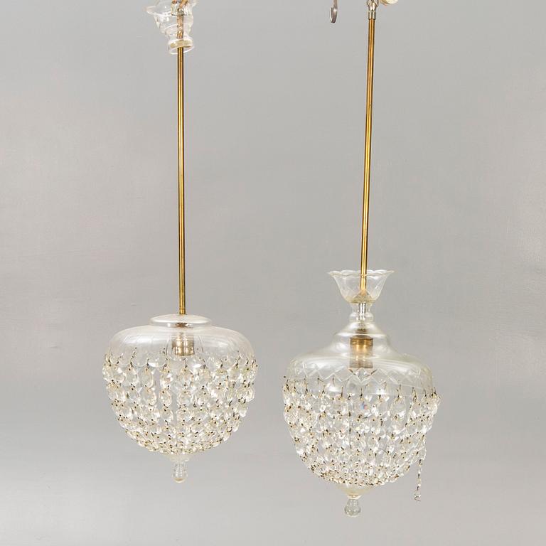 A pair of ceiling pendants around 1900.