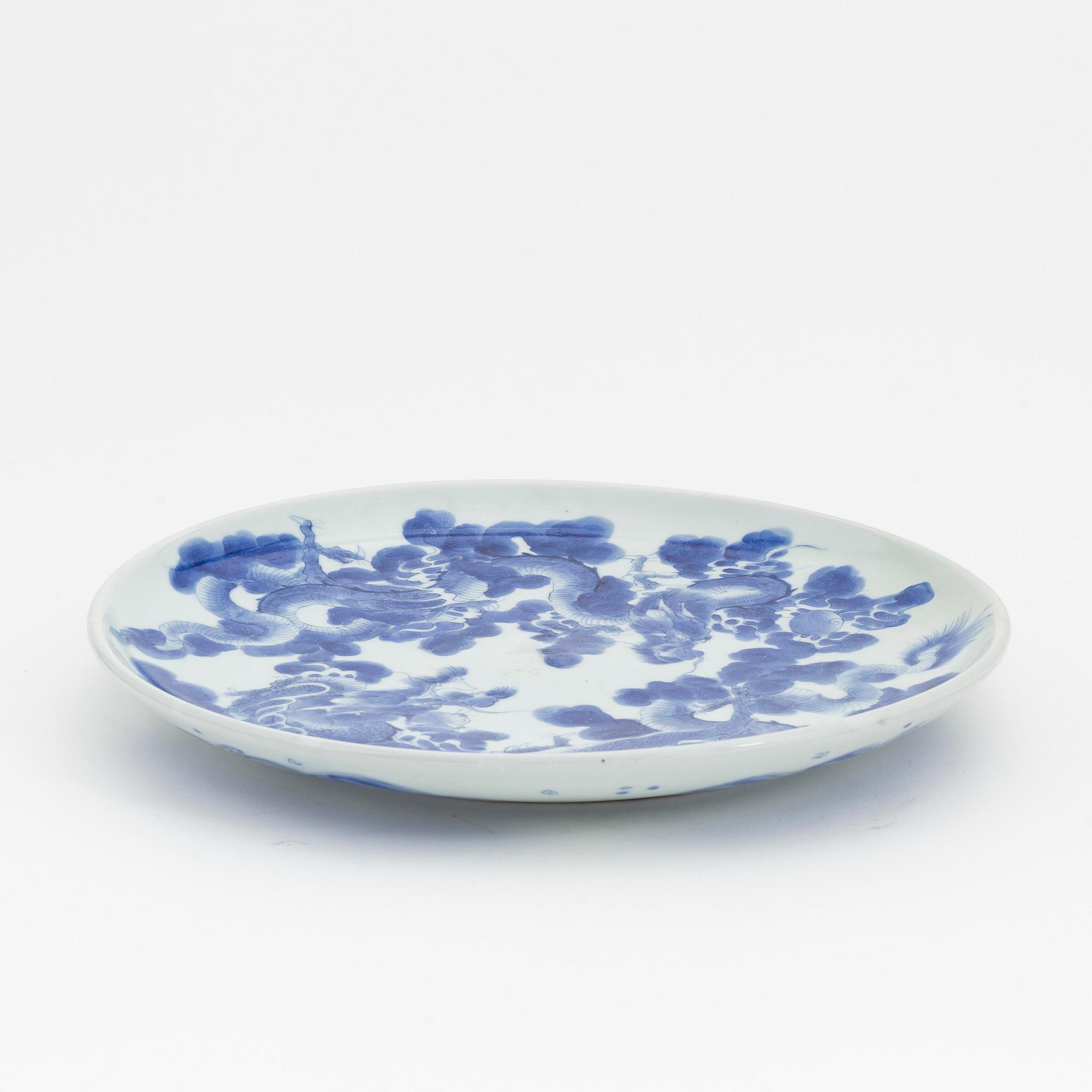 A blue and white large Japanese dragon dish, 20th century.