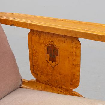 a sofa by NK Stockholm in the 1930's.