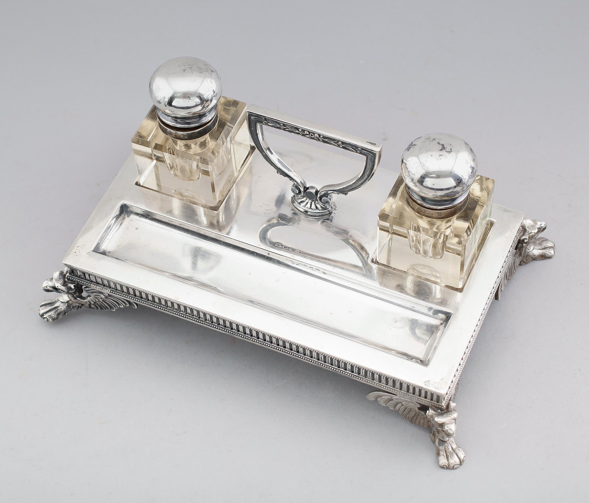 BLÄCKSTÄLL, silver, Stockholm 1905. Ställets vikt ca 609 gram.