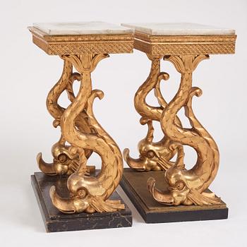 A matched pair of Swedish Empire console tables, first half of the 19th century.