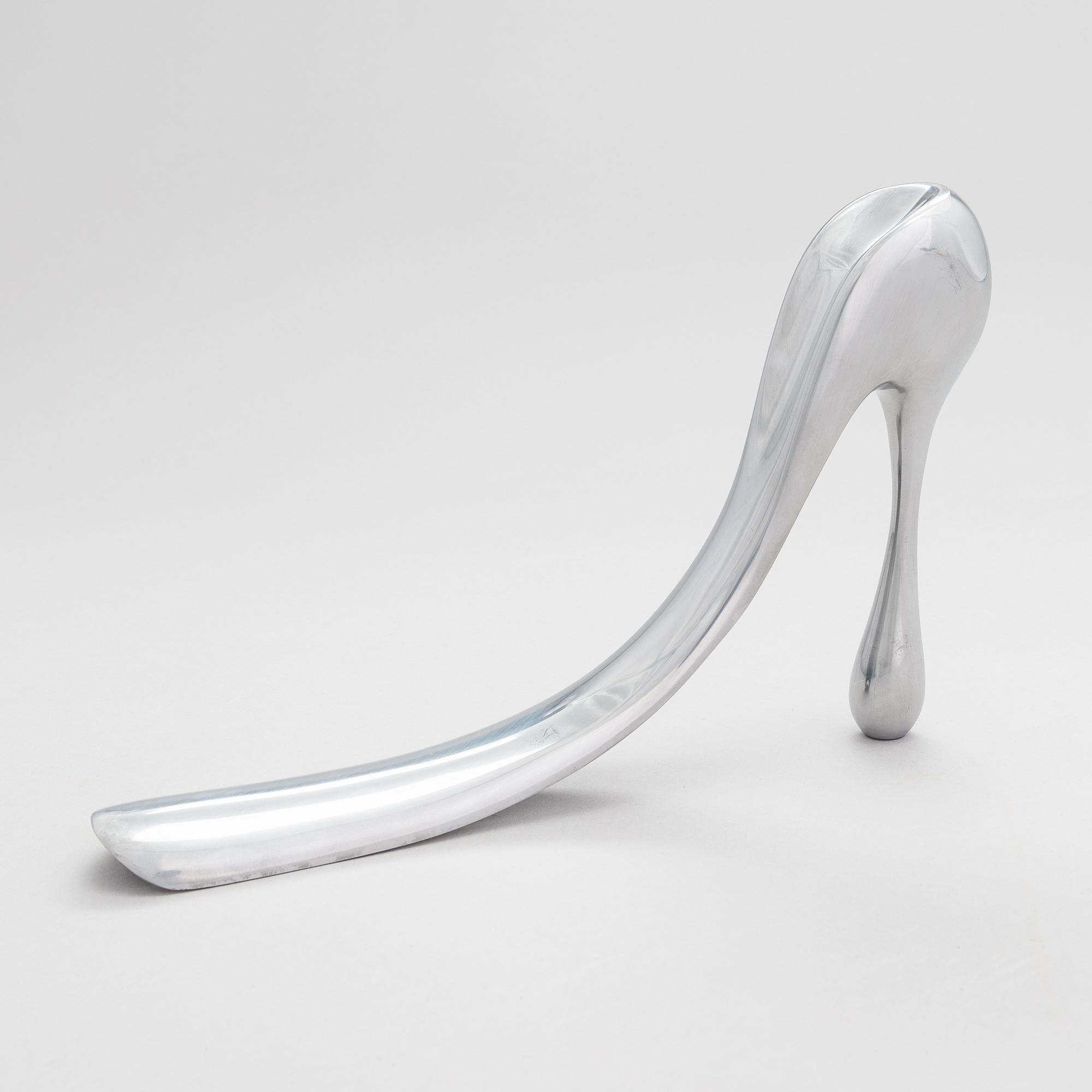 A metal shoe horn by Manolo Blahnik, 2000s.