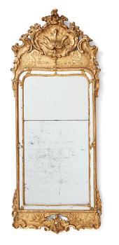 86. A Swedish Rococo mirror dated 1763.