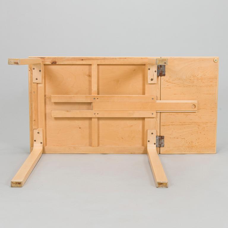 Alvar Aalto, A mid-20th century drop leaf table and three chairs for O.Y. Huonekalu-ja Rakennustyötehdas A.B.