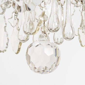 A six-branch rococ-style chandelier, first part 20th century.