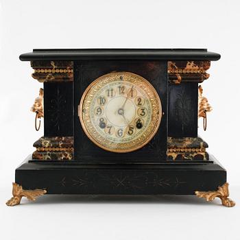 A 19th century table clock by New Haven Clock Co in New Haven, USA.