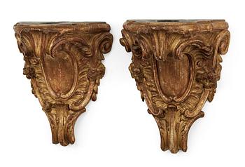 A pair of Swedish Rococo 18th century gilt wood consoles.