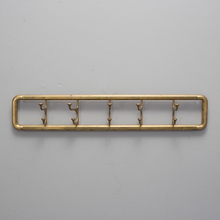 A BRASS COAT HANGER 1920'S.