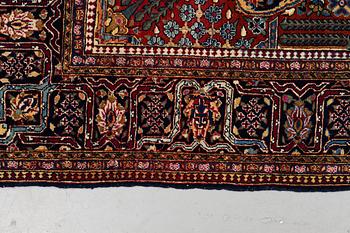 A rug, semi-antique Kashan, ca 216,5 x 140 cm.