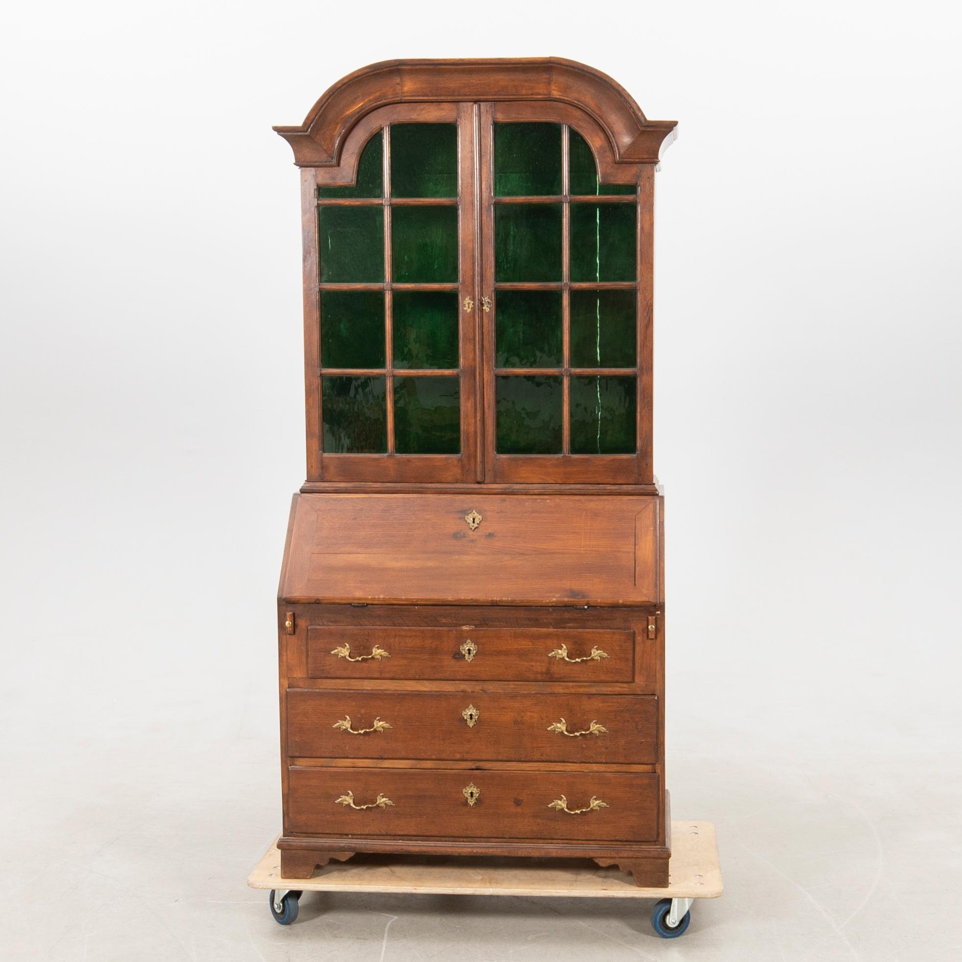 Slant-front secretary with a glazed section, 18th century.