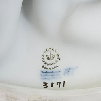 A porcelain figurine of a boy and girl model 3171 Royal Copenhagen.