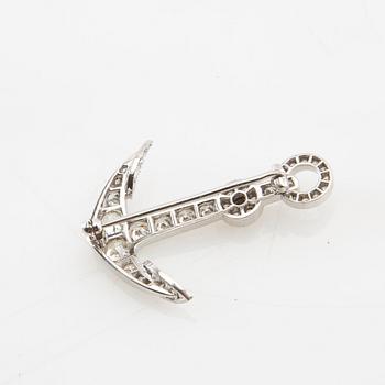 Brooch in the form of an anchor made of 18K white gold with diamonds.