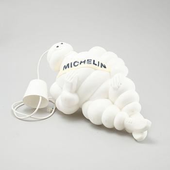 A plastic Michelin Man Lamp from 1966.