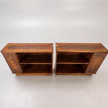 A pair of 1930s birch bookshelves.