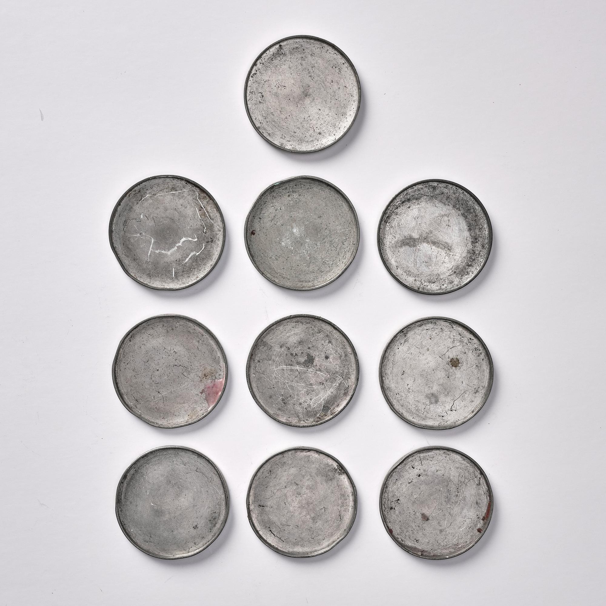 Firma Svenskt Tenn, a set of 10 pewter glass coasters, Svenskt Tenn Sweden 1934 ( 2) and 1946. Alva & Gunnar Myrdal Collection.