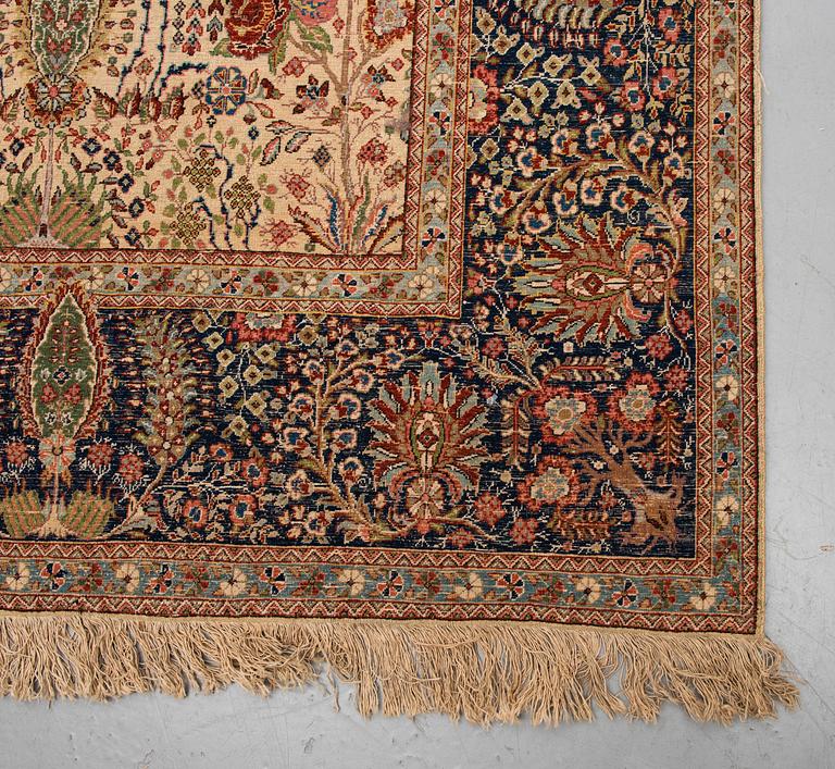 A CARPET, a semi-antique Tabriz probably, figural, ca 325,5 x 226 cm.