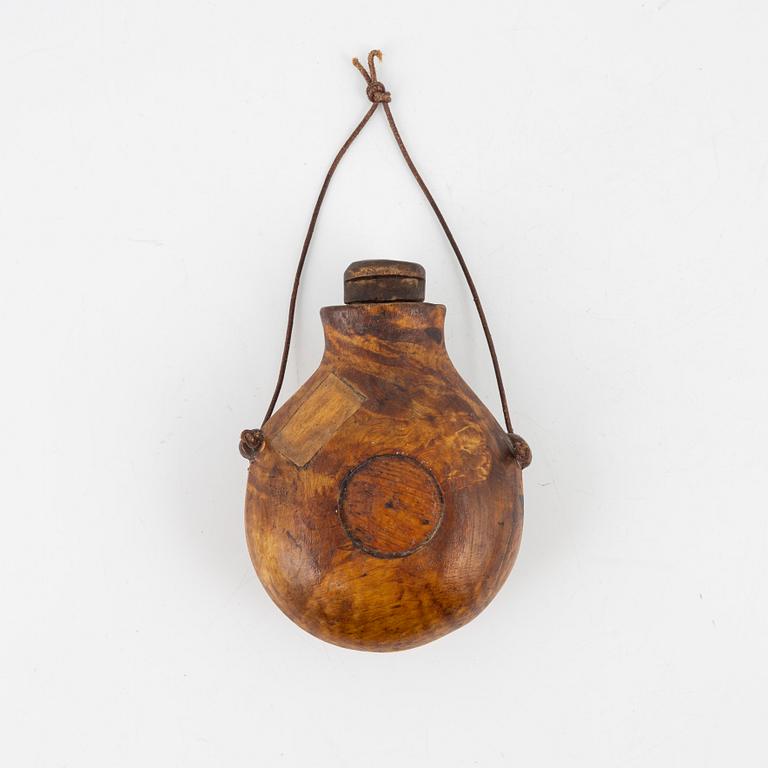A birch salt bottle, dated 1925.