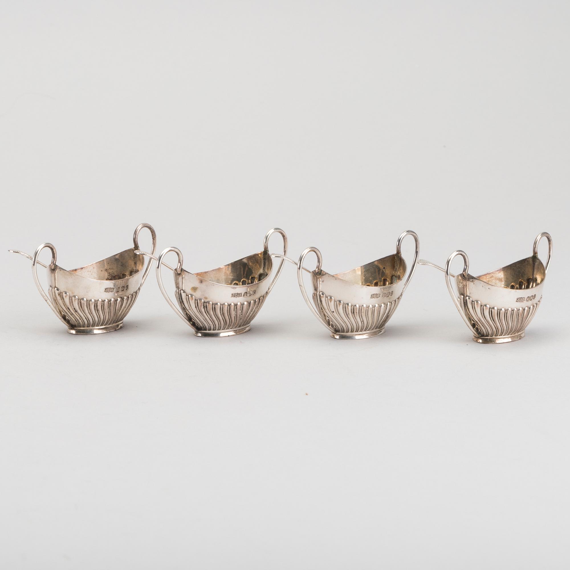 An English set of four silver salters with spoons mark of James Dixon & sons Sheffield 1895, weight 166 gr.