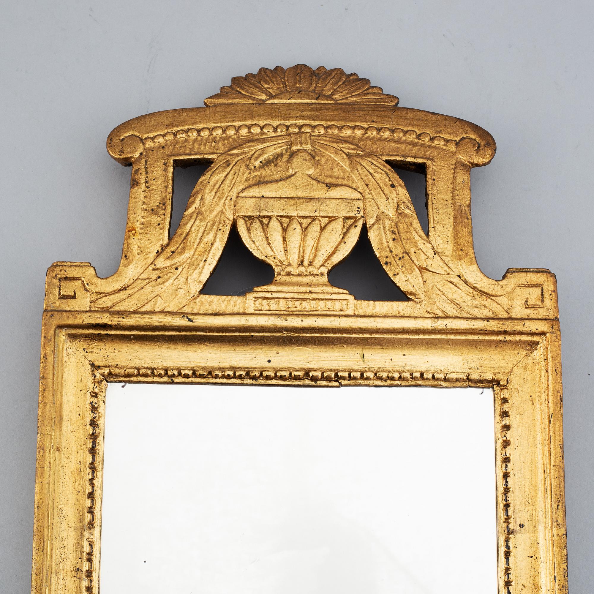 A Swedish 18th century gilt wood mirror.