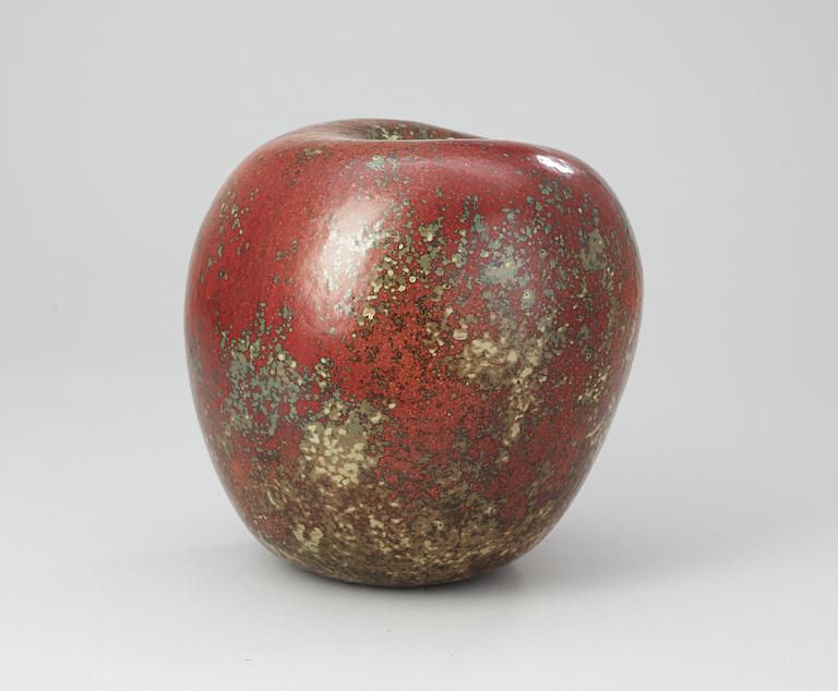 A Hans Hedberg faience apple, Biot, France.