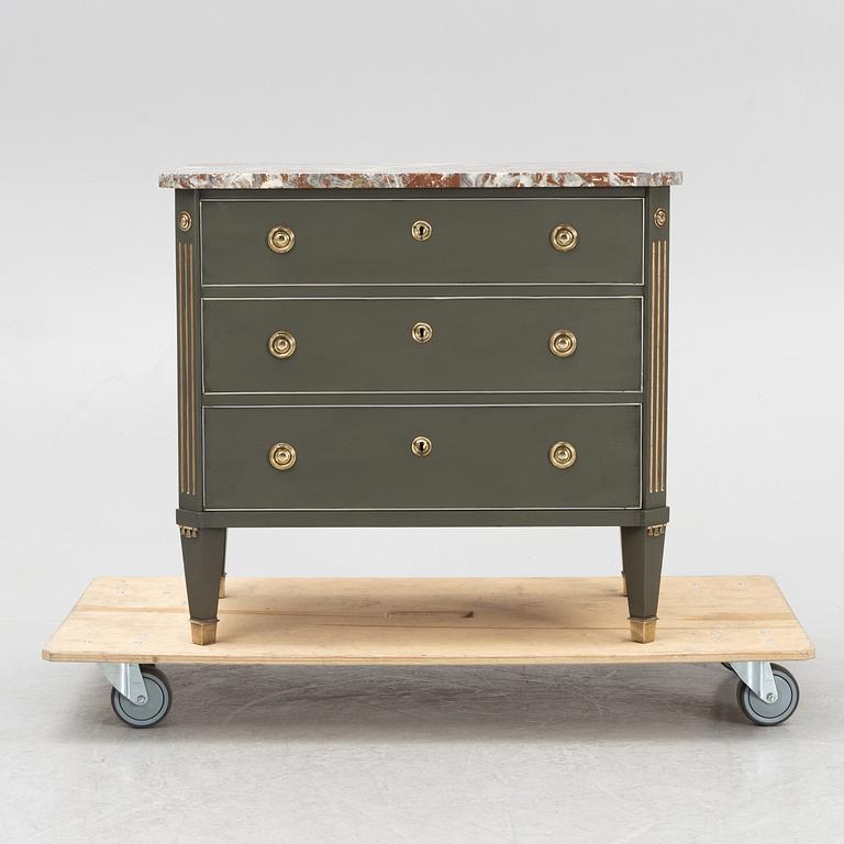 A Gustavian style chest of drawers, mid 20th Century.