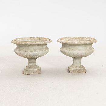 A pair of 20th century concrete garden urns.