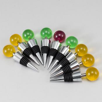 A set of 9 champagne stoppers, 1970s.