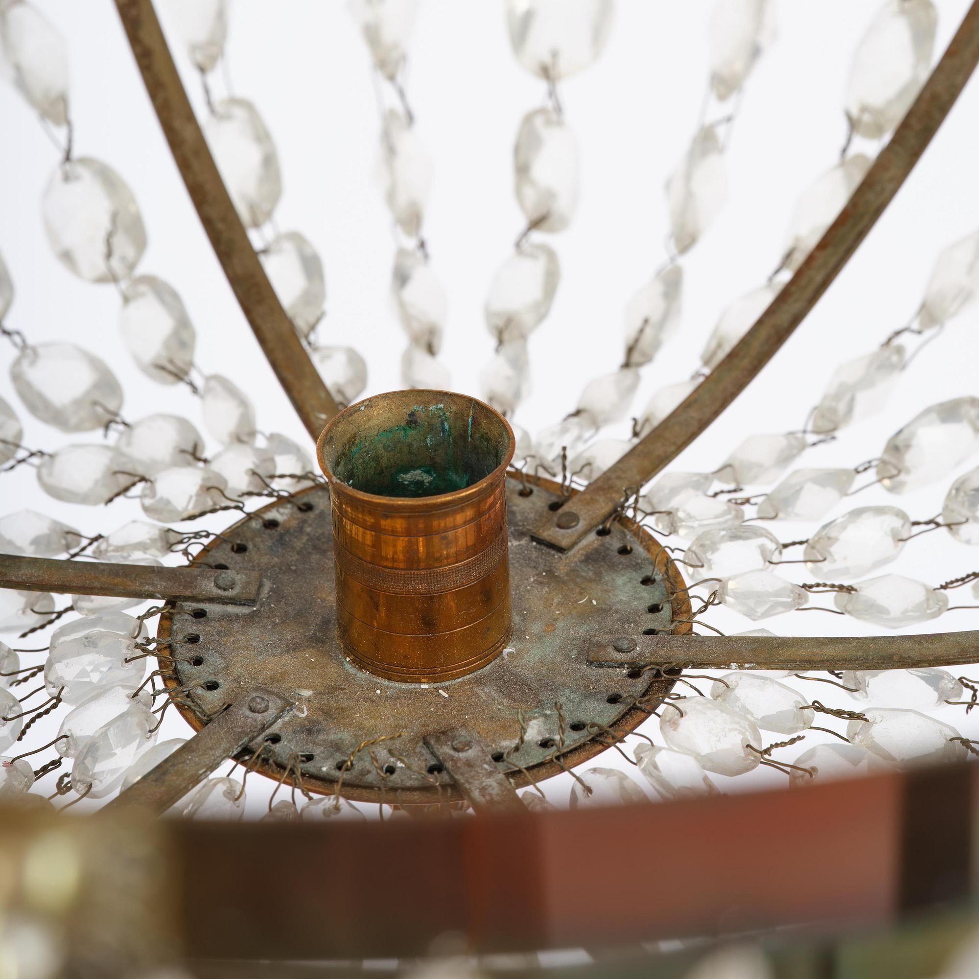 A late Gustavian gilt brass and cut glass seven-light chandelier, circa 1800.