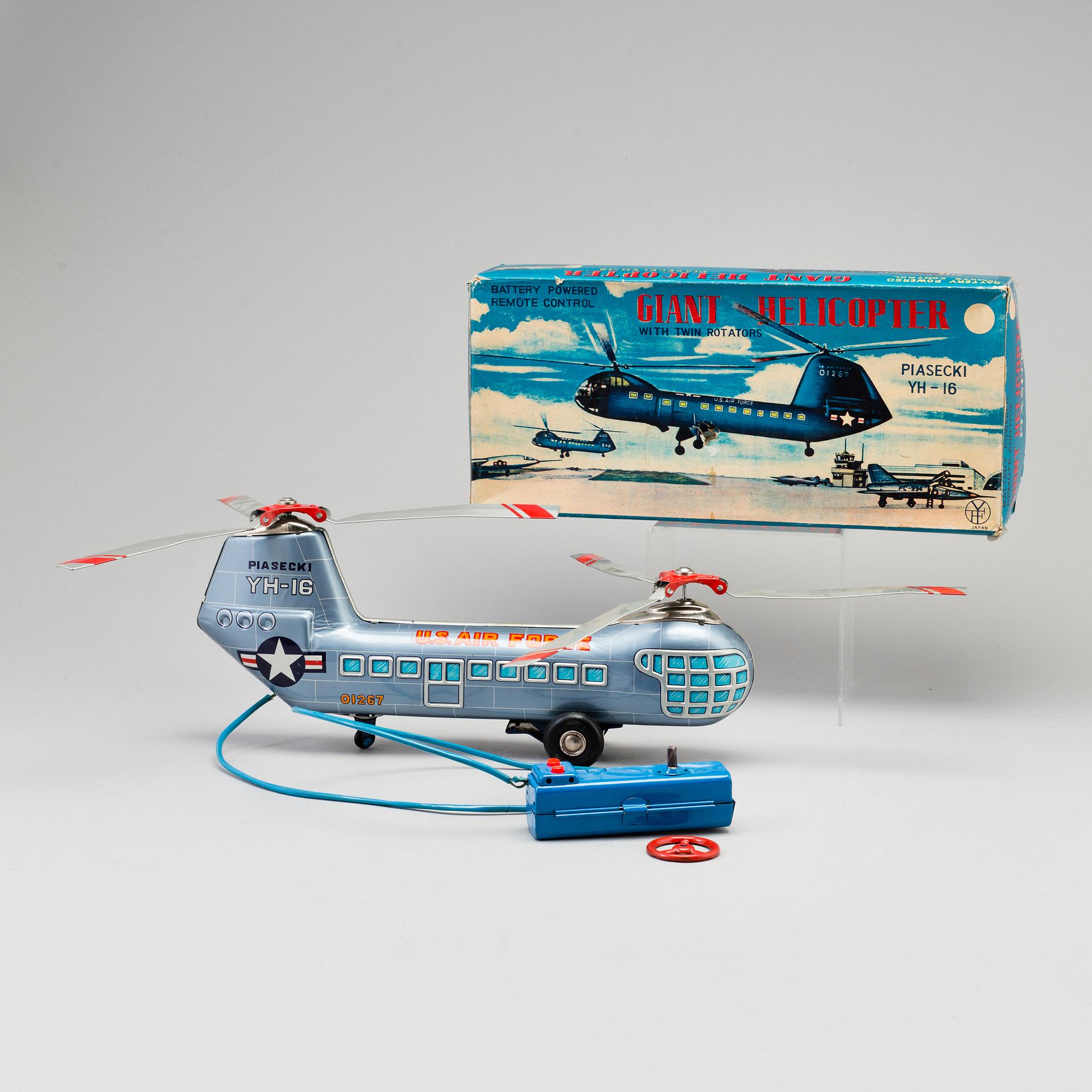 A toy metal car "Sunday Driver", Kosuge, Japan, and "Giant Helicopter", YF, Japan. 1960s.