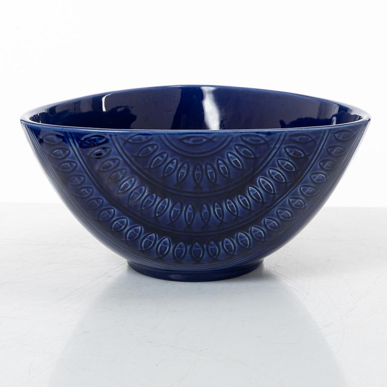 Hertha Bengtson, a stoneware bowl and twelve plates, Rörstrand, Sweden.