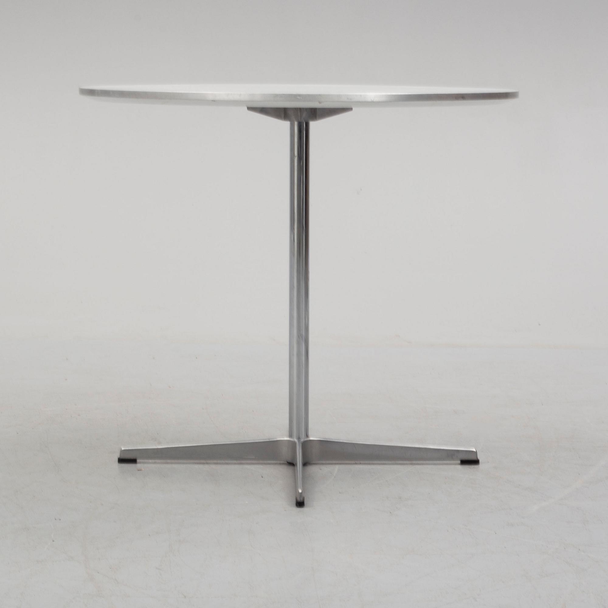 A 'Supercirkel' table by Bruno Mathsson & Piet Hein, Denmark, 1978.