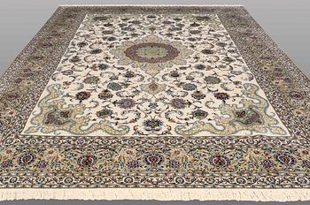 A signed so called Royal Kashan carpet, ca 432 x 313 cm.