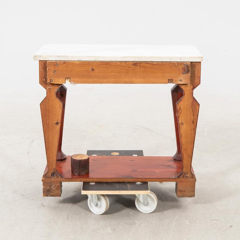 An empire style console table first half of the 20th century.
