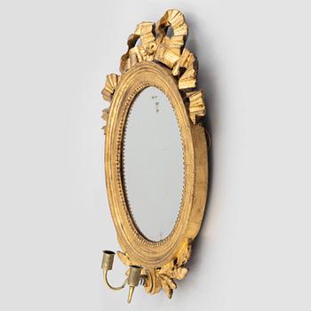 A Gustavian mirror wall sconce, late 18th Century.