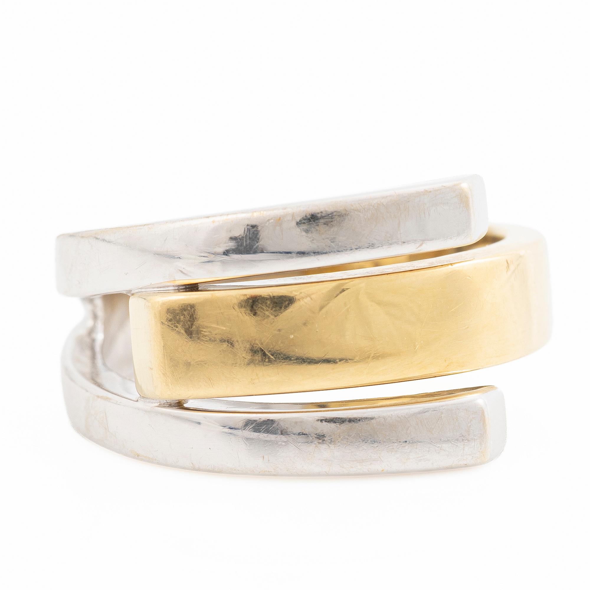 18K gold and white gold ring.