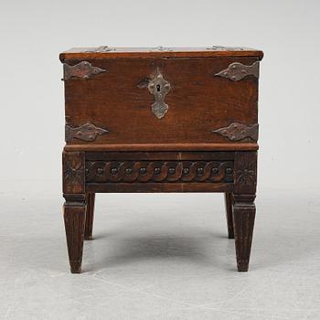 A chest and stand, 19th-20th century.