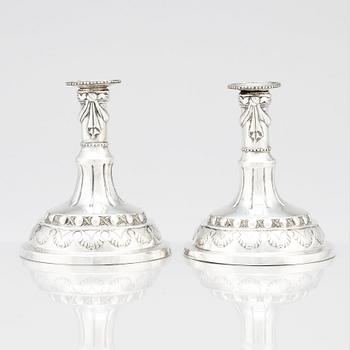 A pair of Swedish silver candlesticks, mark of Sigismund Novisadi the younger, Karlskrona 1780.