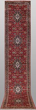 A Keshan runner carpet, 587 x 95 cm.