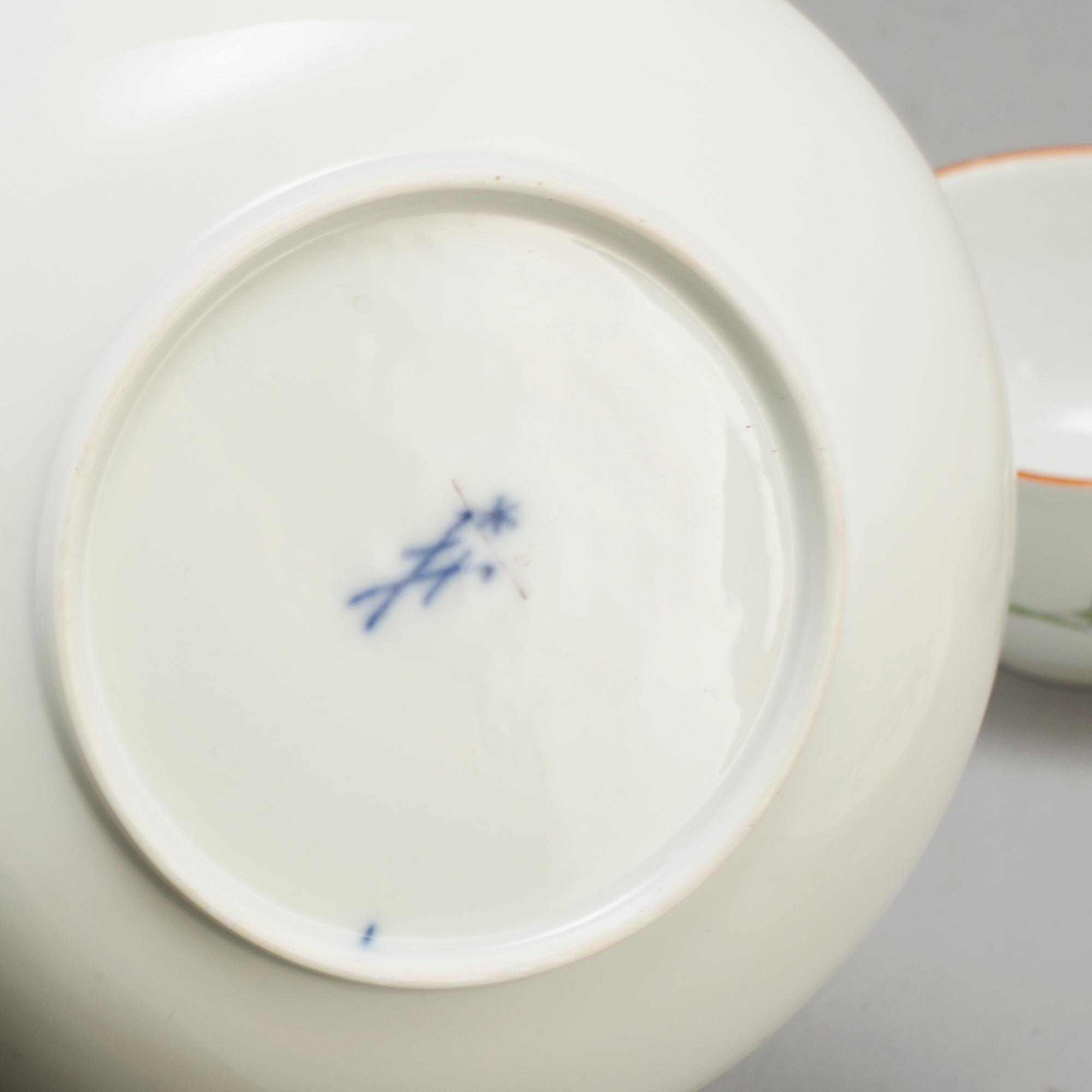 TWO 18TH CENTURY  MEISSEN PORCELAIN CUPS AND SAUCERS,