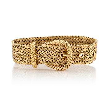 507. An 18K gold braclet by Georges L'Enfant for Hermès.